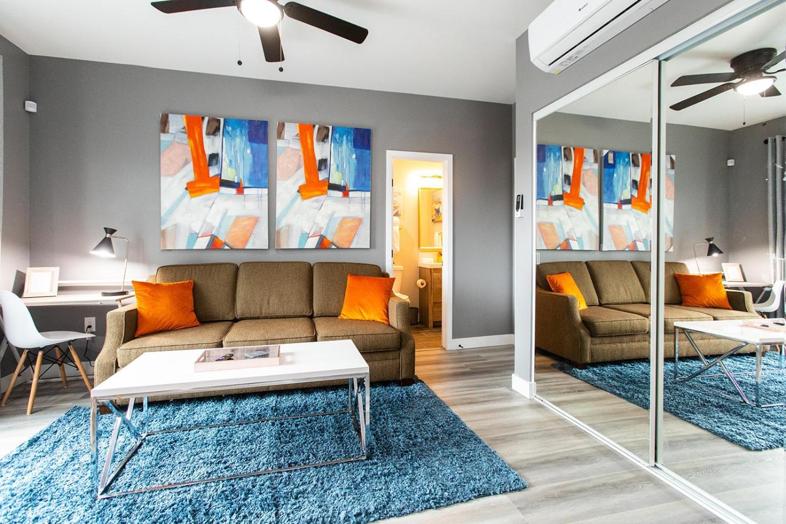 Large-studio-balcony-desk-ac-full-kitchen