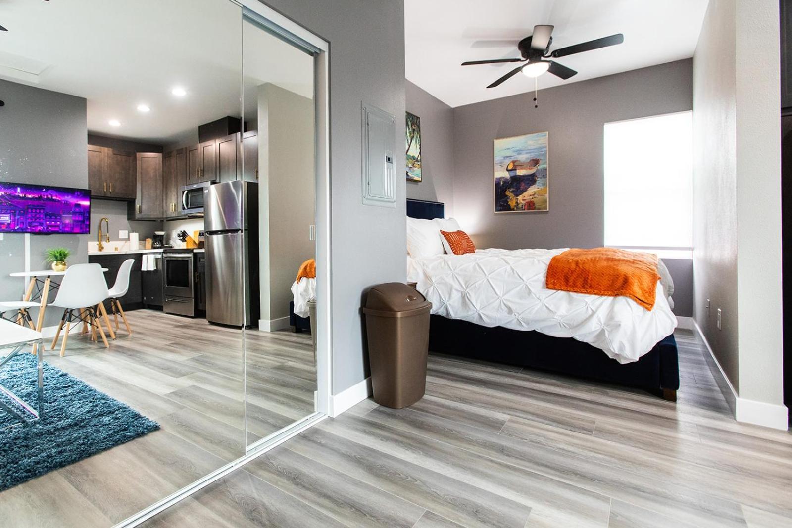Large-studio-balcony-desk-ac-full-kitchen *